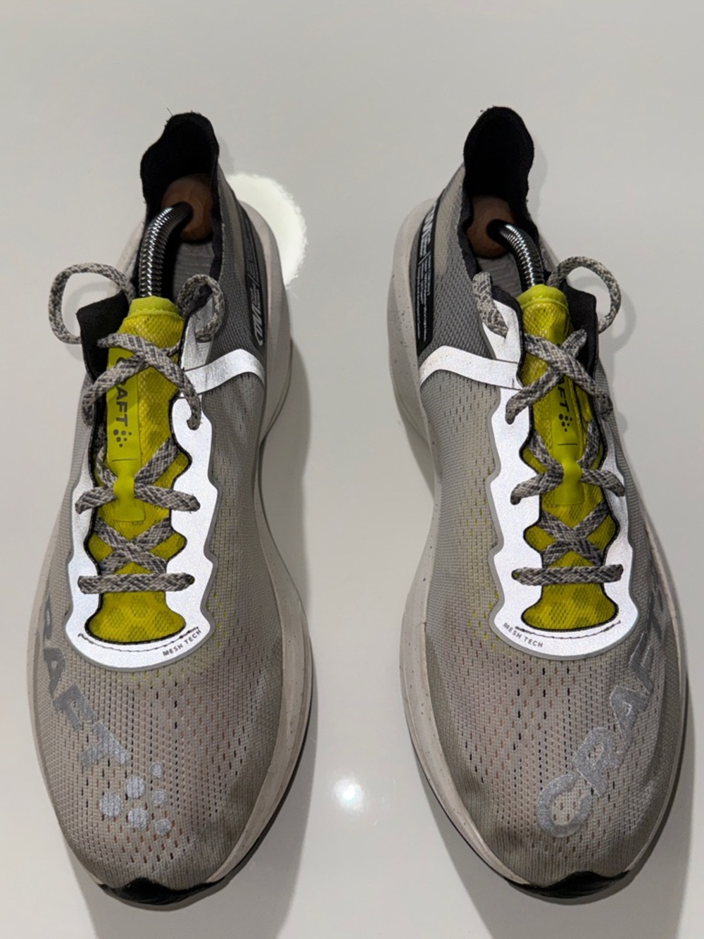 Craft Lightweight Neutral Gray Running Shoes with Bright Yellow Accents